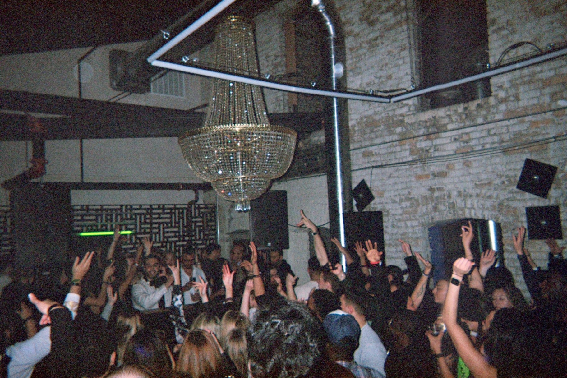 Chapter III - Main event at Eat Street Crossing. The chandelier illuminated souls united in rhythm. — house music and EDM event by Reunion MPLS in Minneapolis